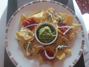 Nachos Served With Salsa, Guacamole, Sour Cream and Jalapenos