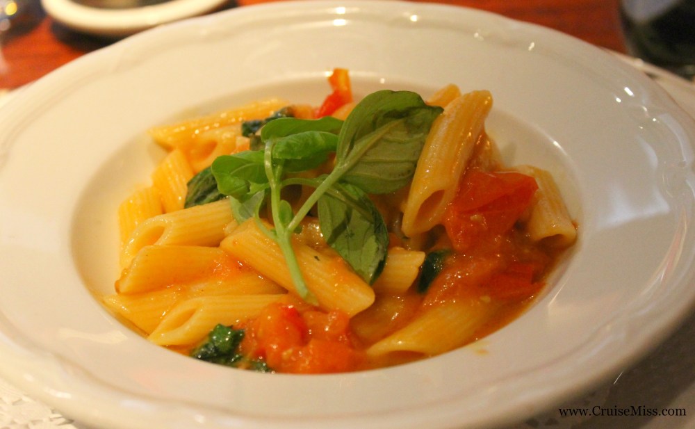 Penne pasta with cherry tomato, garlic and basil sauce