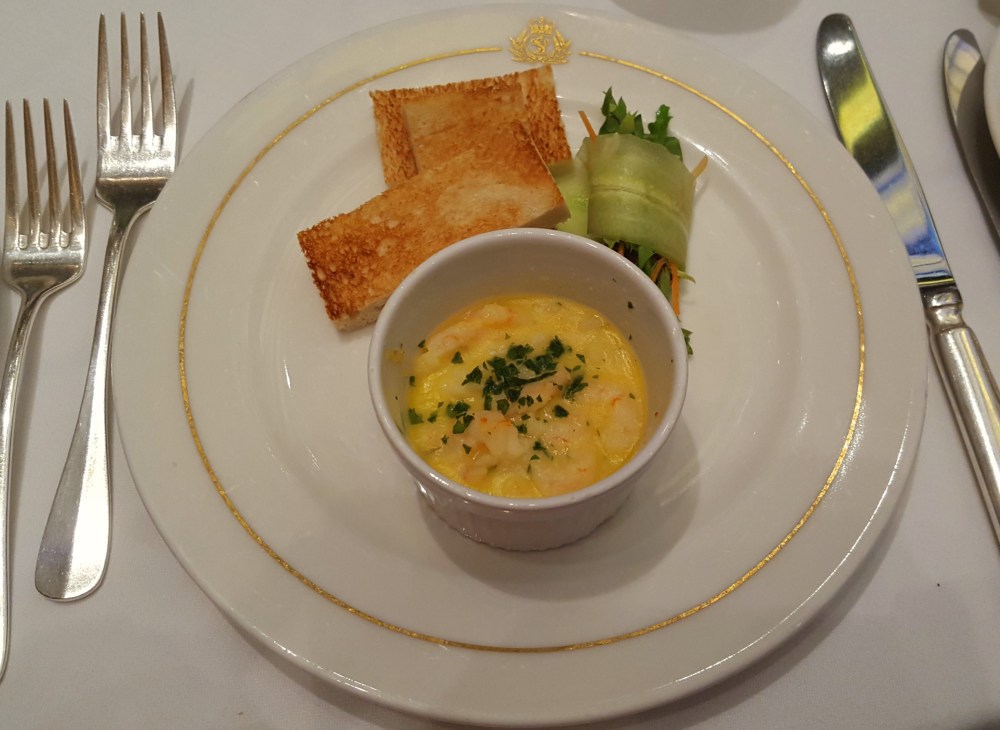 Potted shrimp with soused cucumber and mixed greens